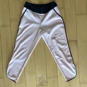 Light pink trousers with black pinstripe